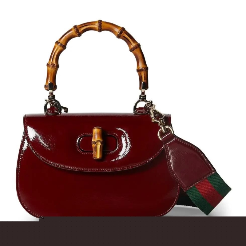 G*u*i top handle bags